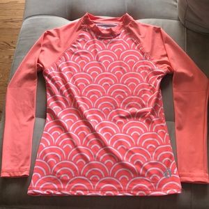 SPF 50 long sleeve coral/white rash guard.